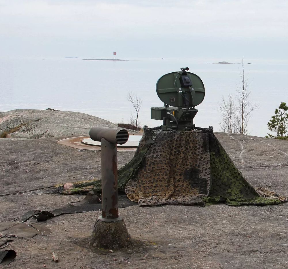 A fire director radar on top of a bunker
