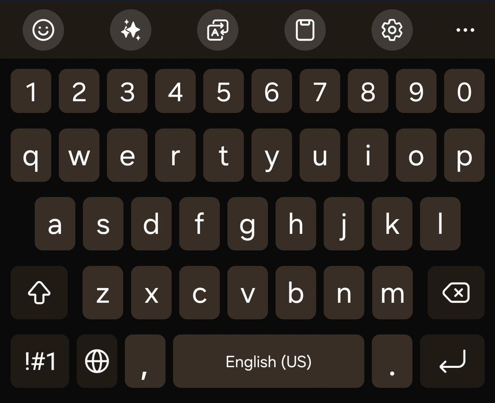 Screenshot of a samsung keyboard. The hotbar has icons for emoji, AI (Unfortunately), translate, clipboard, settings, and more. The bottom row has a globe icon on the second button from the left. The spacebar reads "English (US)"

