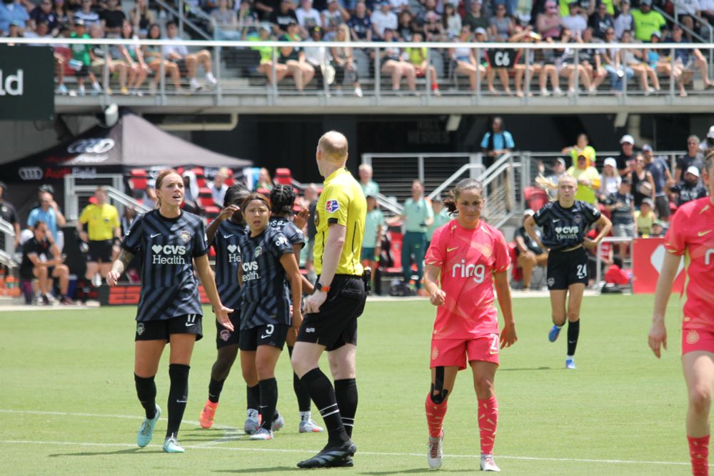 Hal meets the ref's gaze, is confused