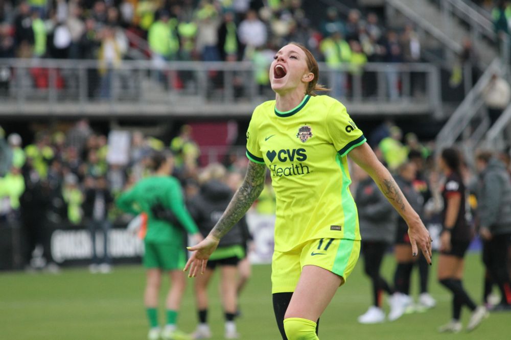 Hands out, skipping forward, mouth wide open