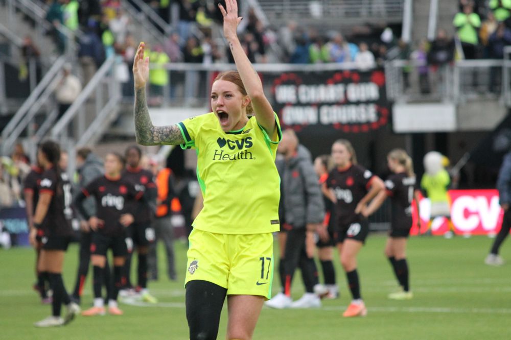 Hands up, jumping in the air