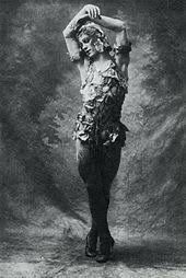 Nijinsky in a floral/leafy leotard and turban