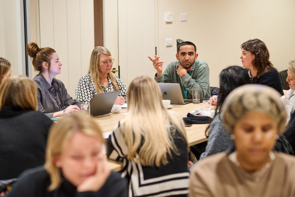 A group of people having a discussion.