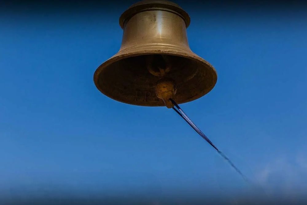 a bell being rung for President Biden 