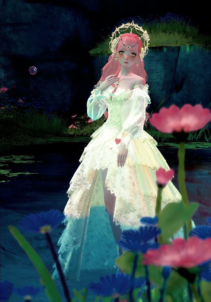 Nikki, in the same spring, looking to the camera. You can see a crown on her head that's gold. A pink flower stands up on the right side of the image. 