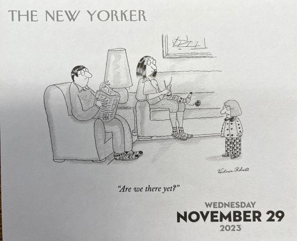 Living room setting. Kid asks the parents “Are we there yet?”