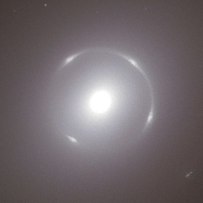 Image of the Einstein Ring gravitational lens in the center of NGC 6505. The ring is the bent image of the background galaxy, the central bright spot is the center of NGC 6505 itself.