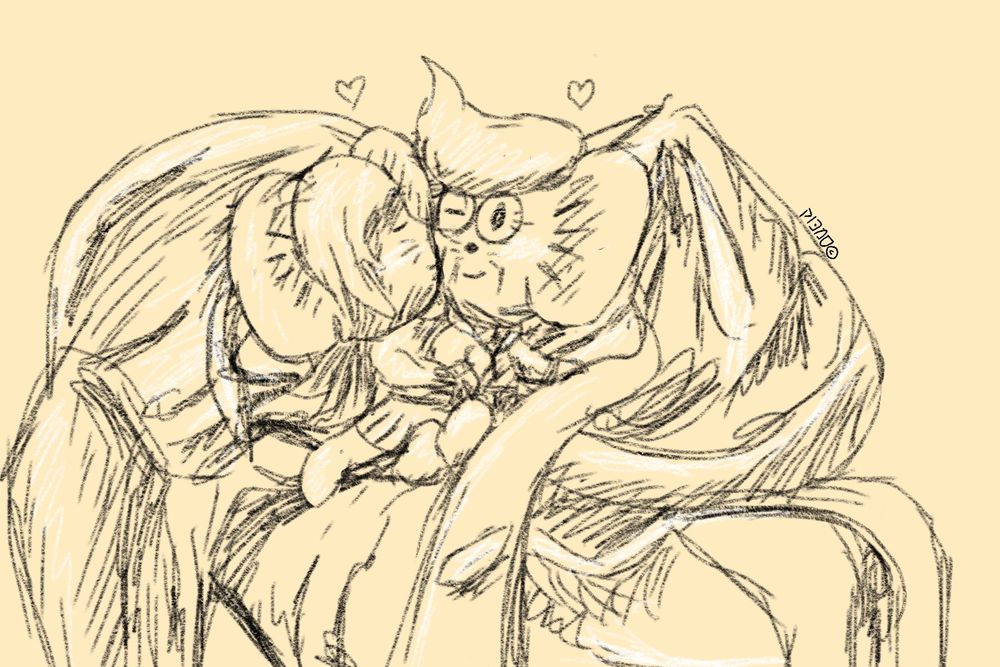 Clive and Arven snuggle in an abandoned jacket