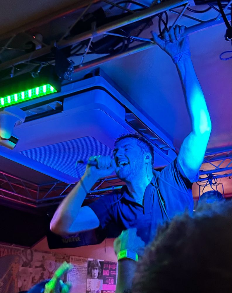 Charlie Herridge from SNAYX on stage