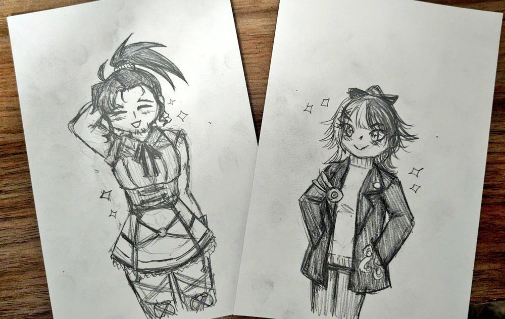 Josuiji Shinri and Shiori Novella stand side by side on paper flashcards. They are wearing each other's casual outfit, with Shinri looking bashful in Shiori's lolita-esque short dress and Shiori looking confident in Shinri's peacoat and turtleneck.