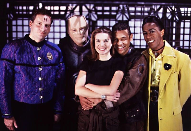 Rimmer, Kryten, Kochanski, Lister, and Cat the crew of the Red Dwarf.