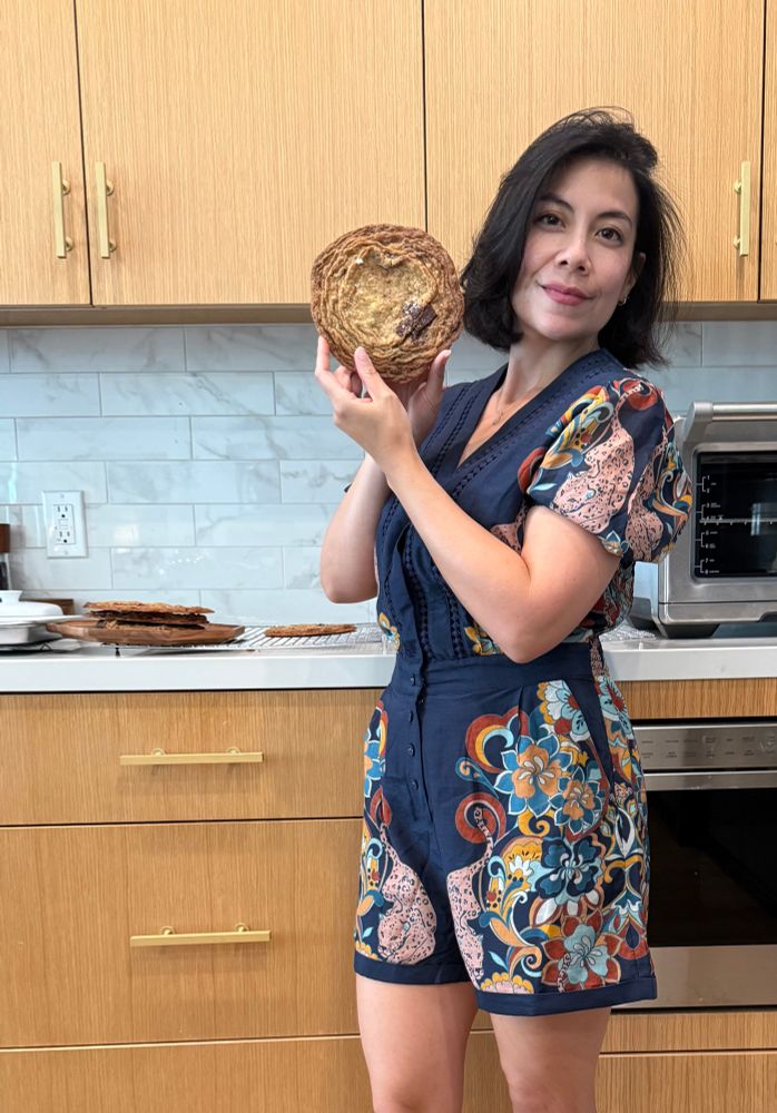 me looking amazing holding a giant chocolate chip cookie that also looks amazing