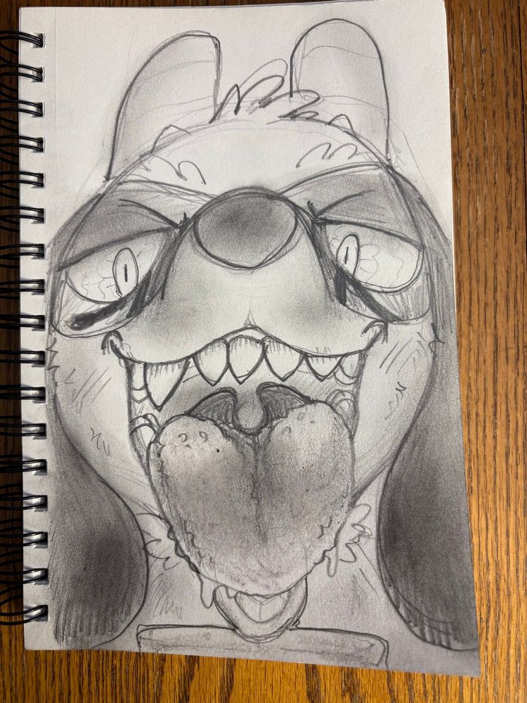 Anubis the Riolu giving the viewer a spooky gaze into his maw 
