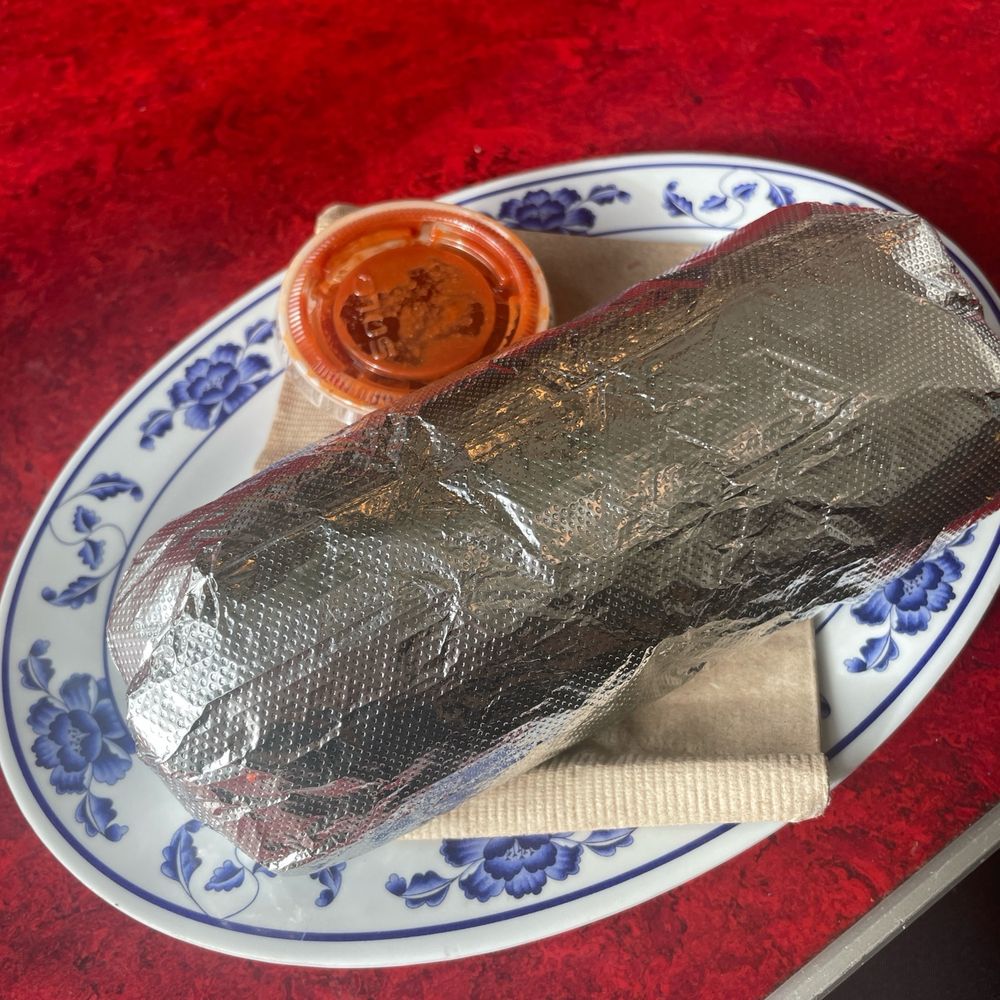 Carne asada breakfast burrito, fully wrapped