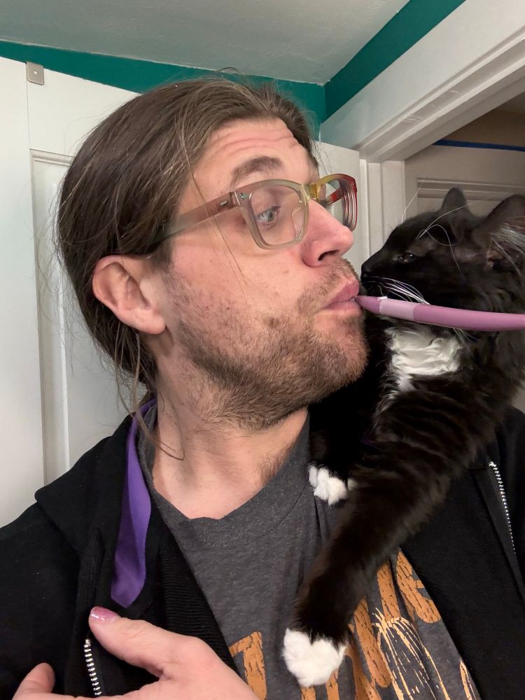 Kitten getting super close to make sure I have indeed brushed my teeth