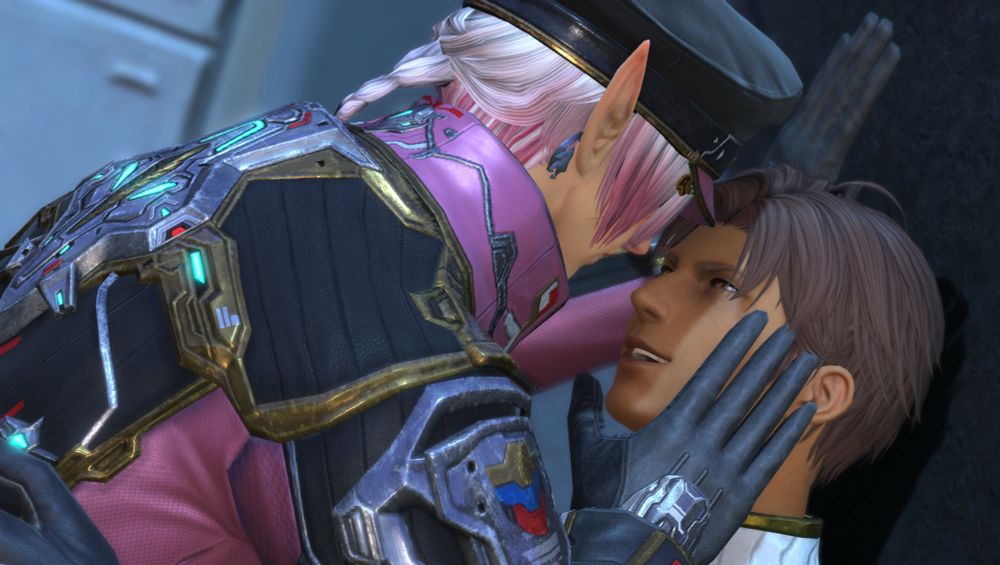 Pyxis (an elezen with white and pink hair and pale skin) is wearing his Commander coat and hat, one of his gloved hands is resting against the wall, while the other rests against Alerot’s (a hyur with short brown hair, golden eyes and slightly tanned skin) face. Alerot himself is smirking as he looks at Pyxis. One of his own hands is wrapped around Pyxis’s waist.