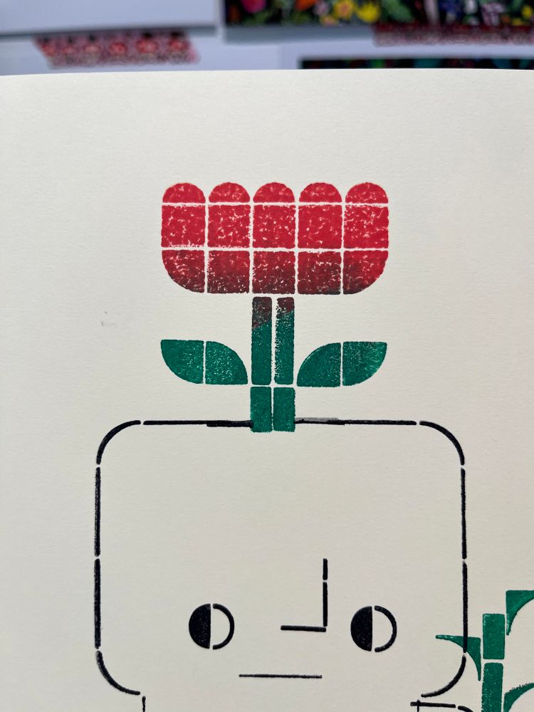 A close up of the same block print. The image shows the flower up close 