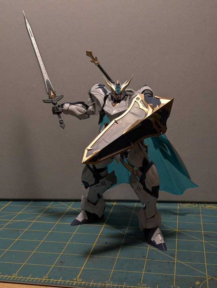 Photo of SNAA Tristan standing with its sword at the ready. 