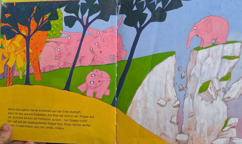 A page from an Elmer book where a pink elephant gets pushed off a cliff on his 100th birthday 