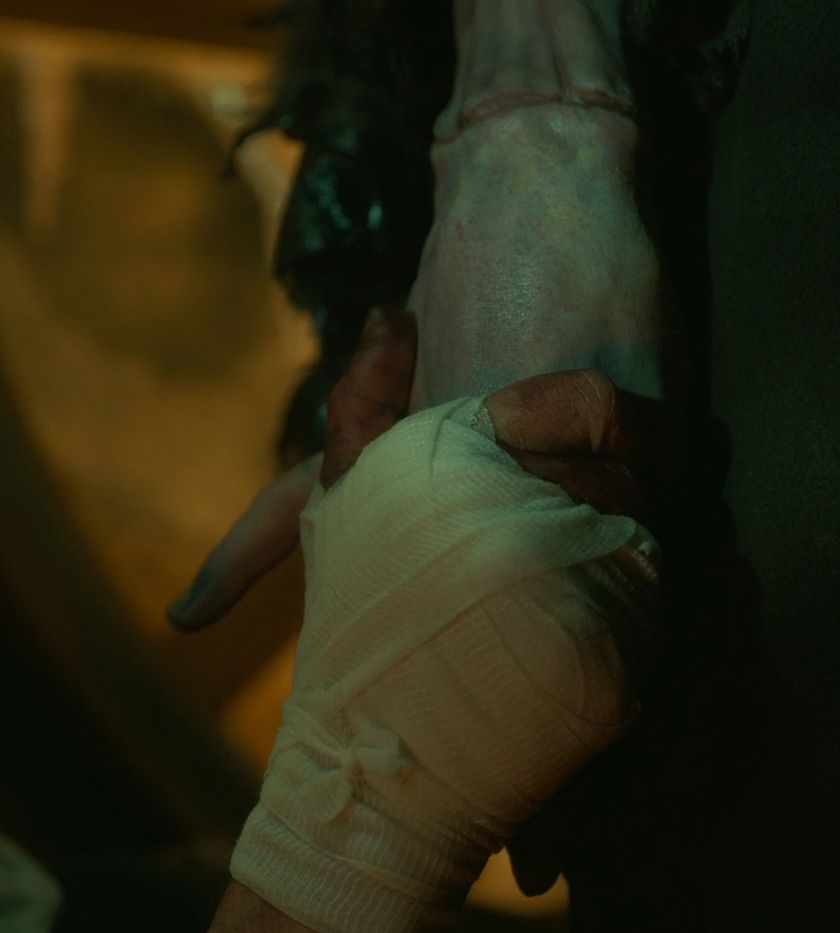 On the ship at the end of the creature's tale, Victor has reached for the creature's hand to take it; the creature turns his hand after a moment to sort of reciprocate, in a tender gesture.