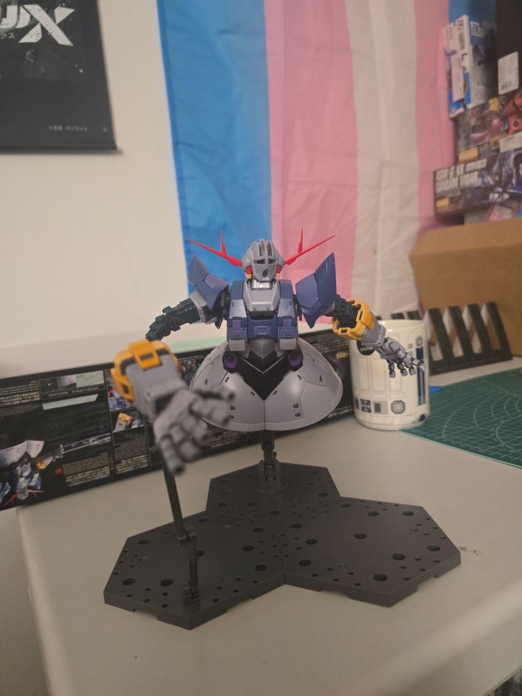 RG Zeong in front of a trans flag