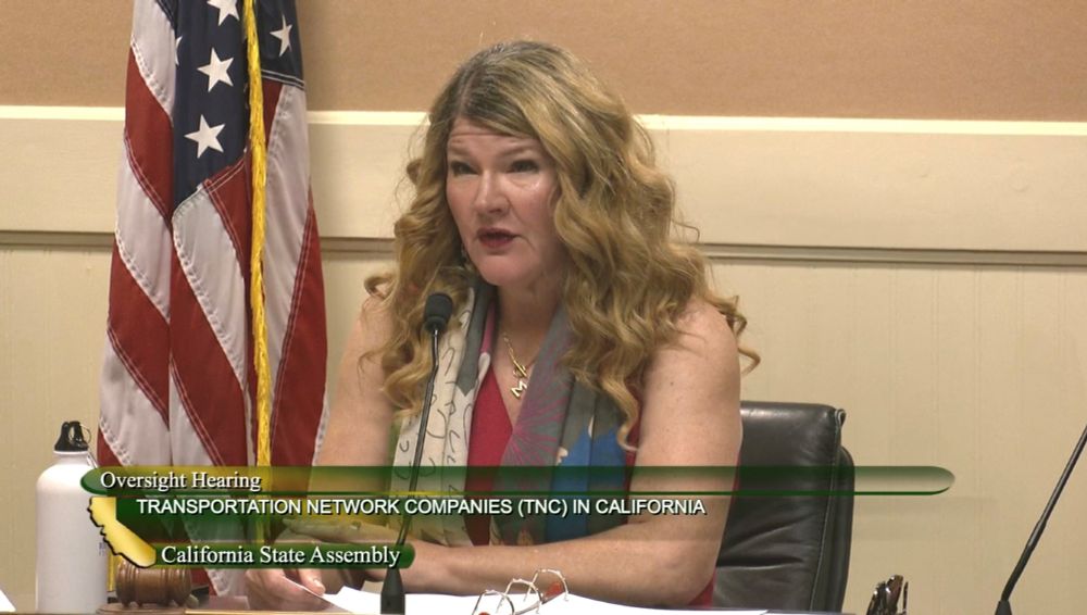 Assemblymember Boerner is seated at the dais for an oversight hearing on Transportation Network Companies in California.