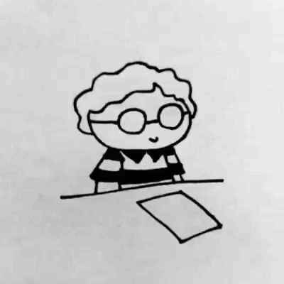 Wackelndes Gif einer Cartoon-Zeichnung von mir, an einem Tisch sitzend, vor einem weißen Blatt Papier.