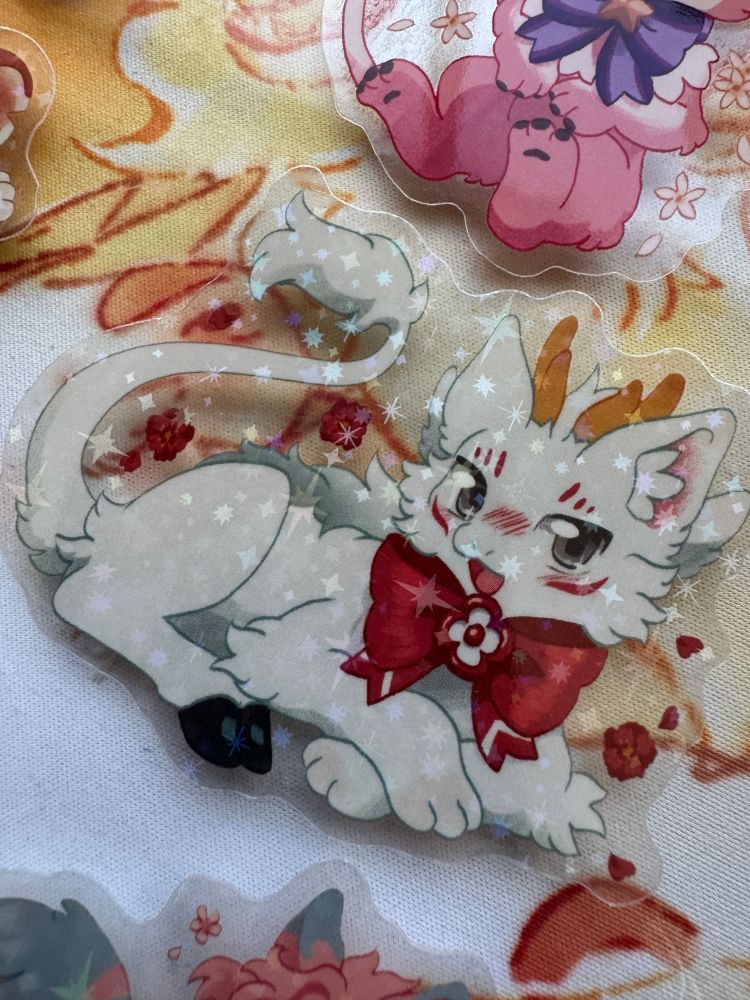 photo of clear glitter sticker of sibuxiang the white quilin.