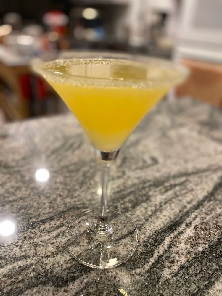 Lemon drop martini on a granite counter