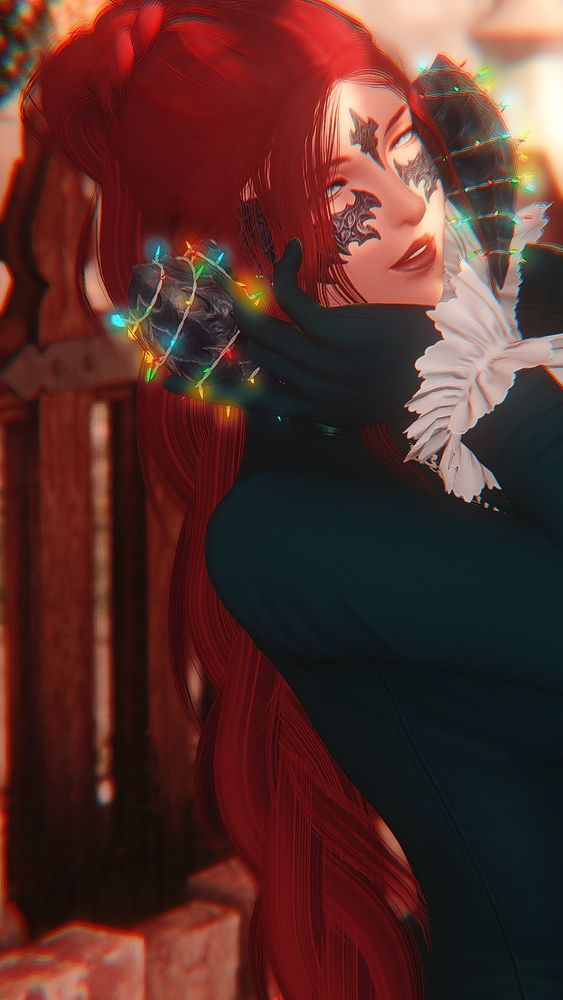 Irie wearing a high neck body suit and leaning back. Only part of her torso is visible with the camera angle, but she's eyeing something past it and smiling with her hands cupping her face