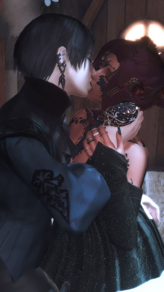 Zero and Irie wearing formal wear, presumably taking a breath of fresh air at some event. Zero wears a black and navy blue, high collared shirt while Irie is wearing a deep green, sparkley strapless gown. Zero is cupping Irie's neck as they kiss. Irie's left hand is wrapping gently around their right wrist where they hold her, the moonlight illuminating their skin