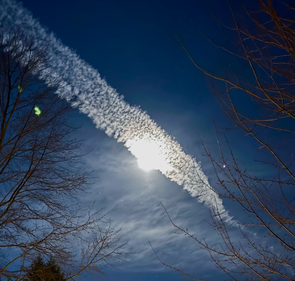 Clouds passing in front of full moon