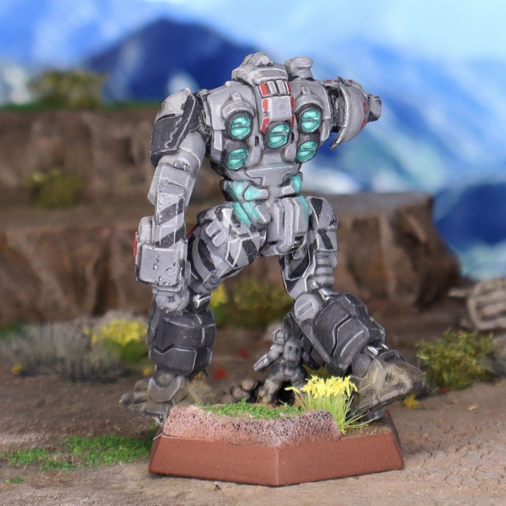A miniature Exterminator battlemech painted in the colors of the reborn Clan Smoke Jaguar.