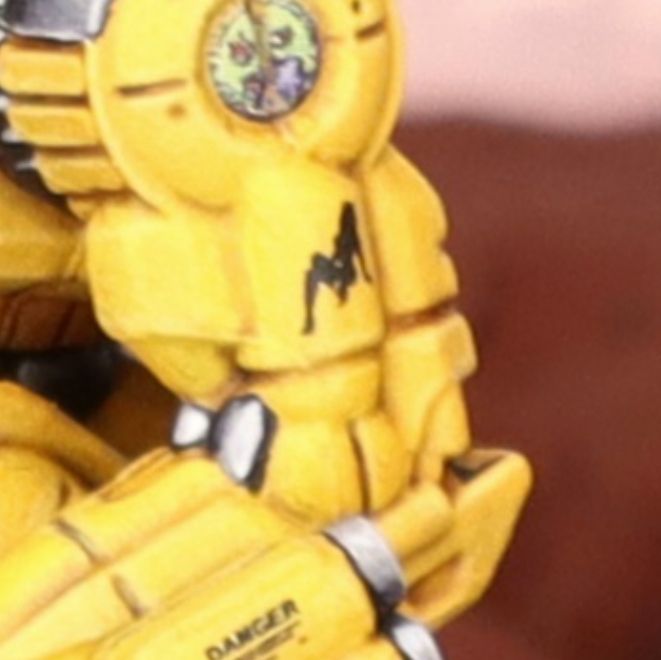 Closeup of the arm decals on the Pillager. The bicep sports a silhouette of a woman in a seductive pose.