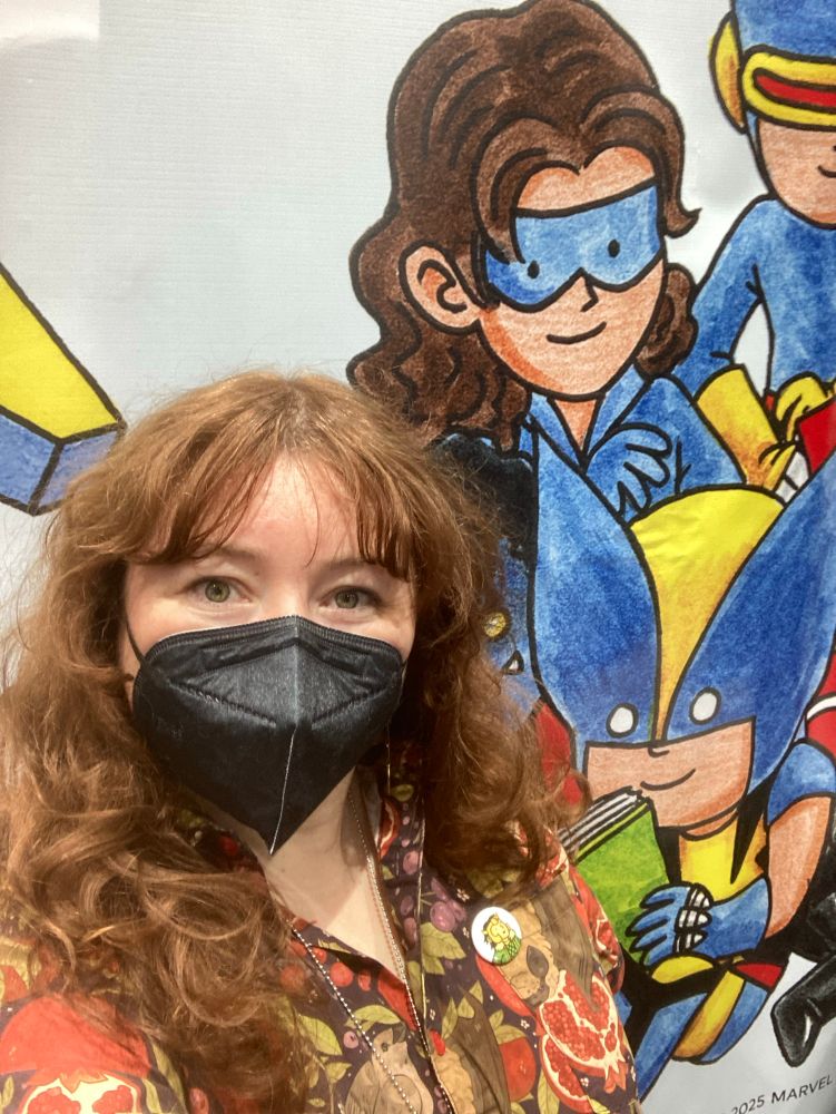 A selfie from inside our booth. I’m in front of a backdrop of Jeffrey Brown’s X-Men art.