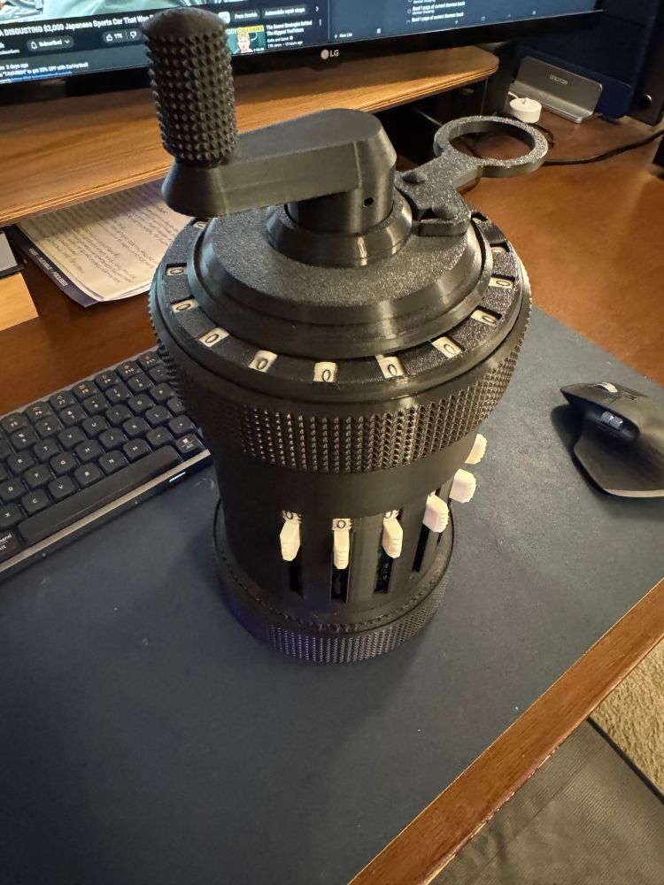 An isometric view of a CURTA Type I mechanical calculator made out of 3D printed parts