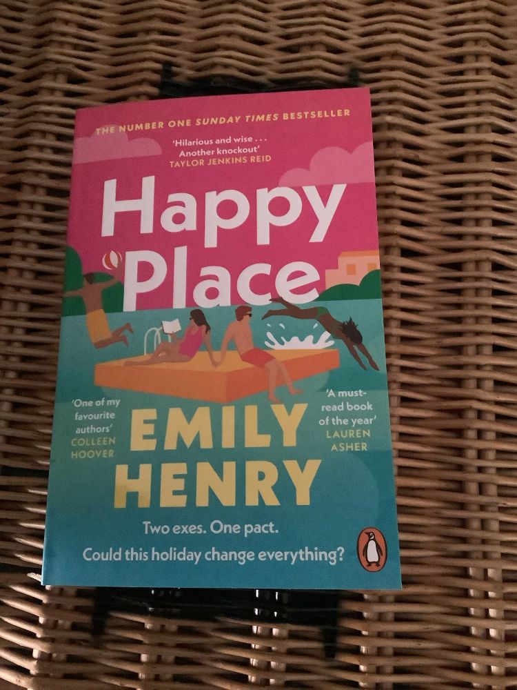 Pic of shiny new book. Happy Place by Emily Henry.