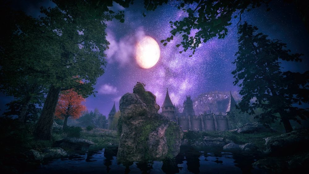 Night time view across a pond towards Skingrad in Oblivion, the moon Masser hangs above the city and the sky is a deep purple hue speckled with stars