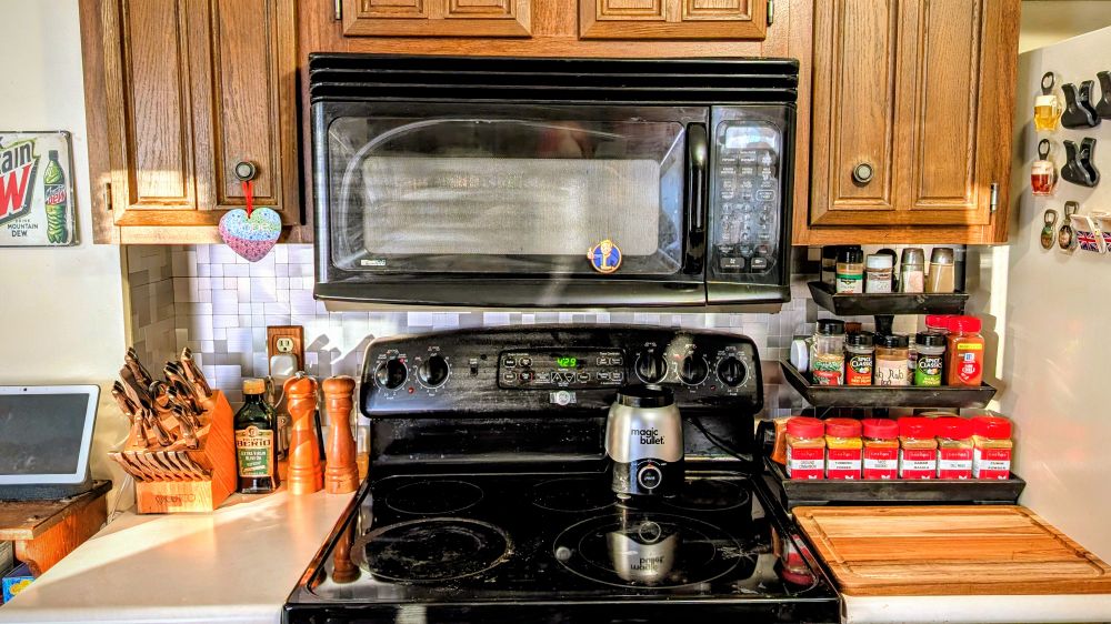 View of the stove side of my kitchen with the new tile backsplash installed.