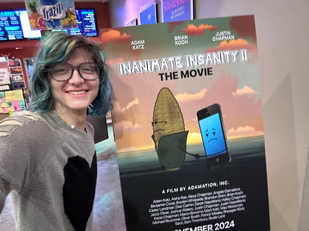 A selfie of me with the Inanimate Insanity II The Movie poster! At the premiere in LA!