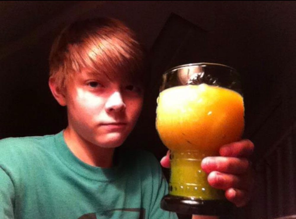 Me in late 2012 watching the Inanimate Insanity S1 finale with a glass of orange juice