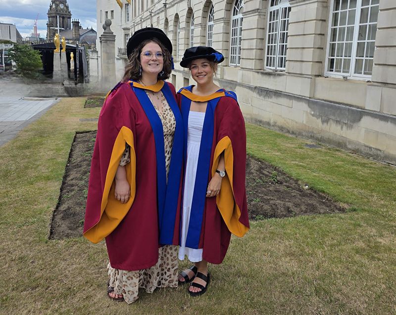 Dr Lucy King (left) and Dr Lucy Eldred (right) at their PhD graduation