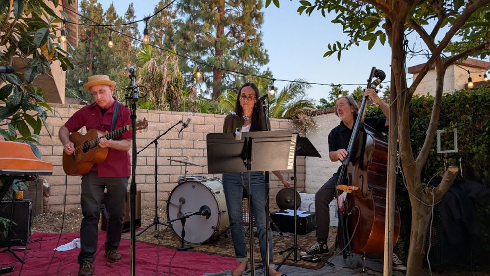 Rob Deeble and friends making music in my back yard.