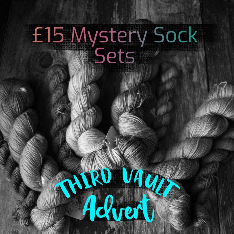 A desaturated gray scale photo of 4 100g skeins and mini skeins next to them with text that reads £15 mystery Sock sets, Third Vault Advent.