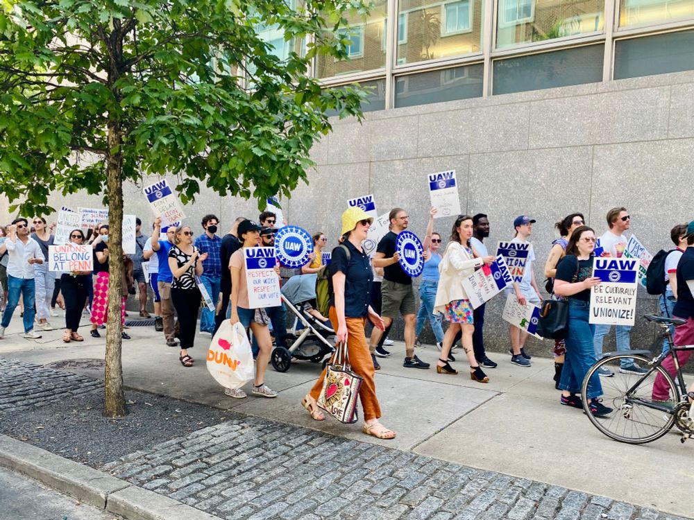 Long line of RAPUP-UAW members marching outside the trustees’ meeting