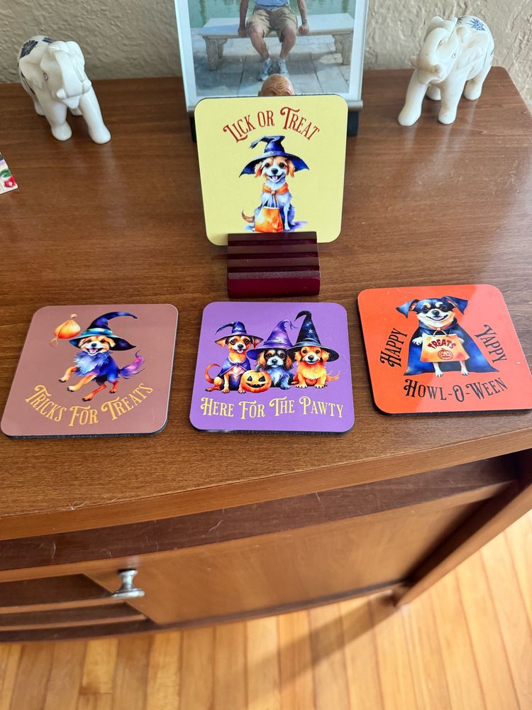 Four dog related Halloween coasters