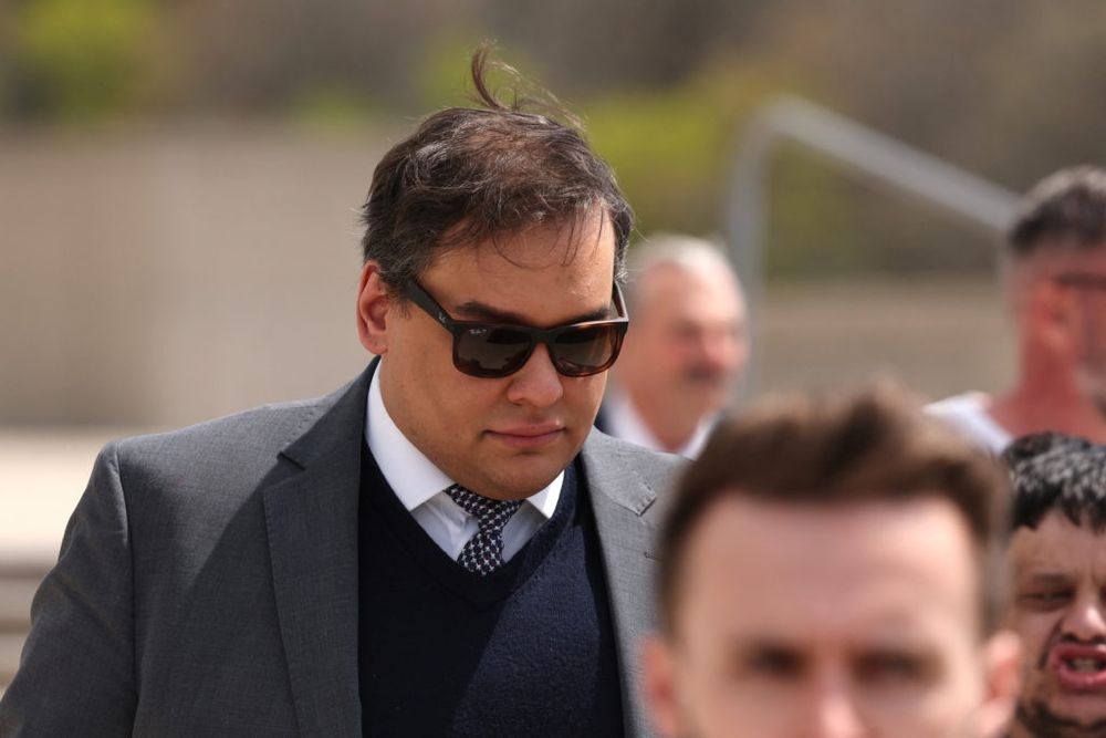 Ex-US Rep. George Santos sobbed as sentenced to over 7 years in prison for fraud and identity theft