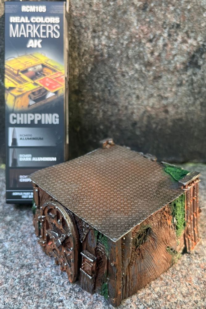 Sprue goo custom built terrain piece miniature for Kill Team wh40k skirmish game. Metal highlights done with AK interactive chipping acrylic markers with their package on the left. 