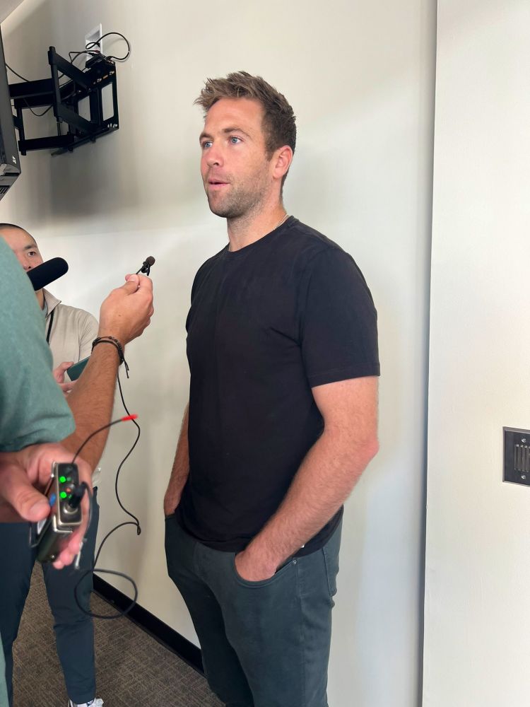 Jason Adam talking to the Padres media