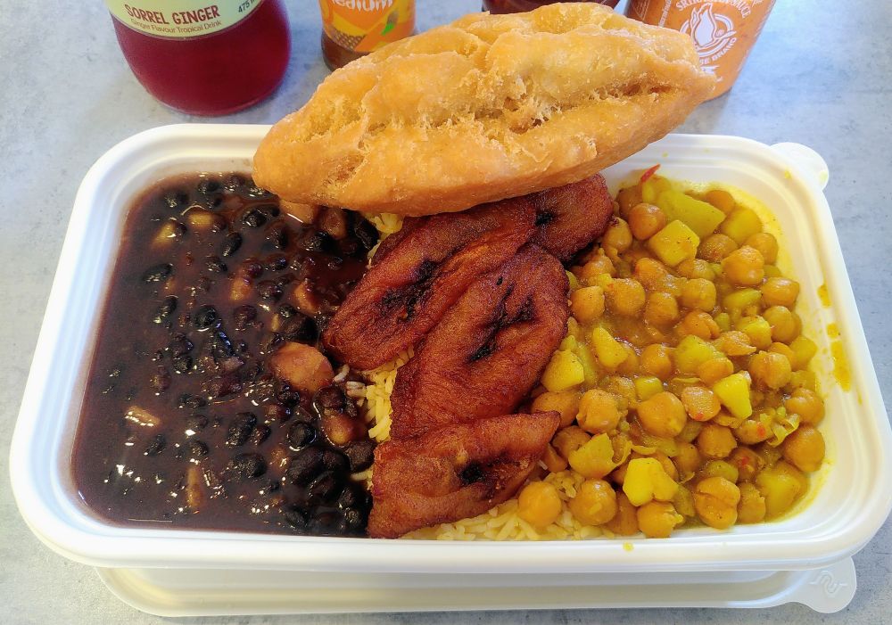 Black bean & sweet potato chilli, chickpea & potato curry, pumpkin rice, plantain and a festival